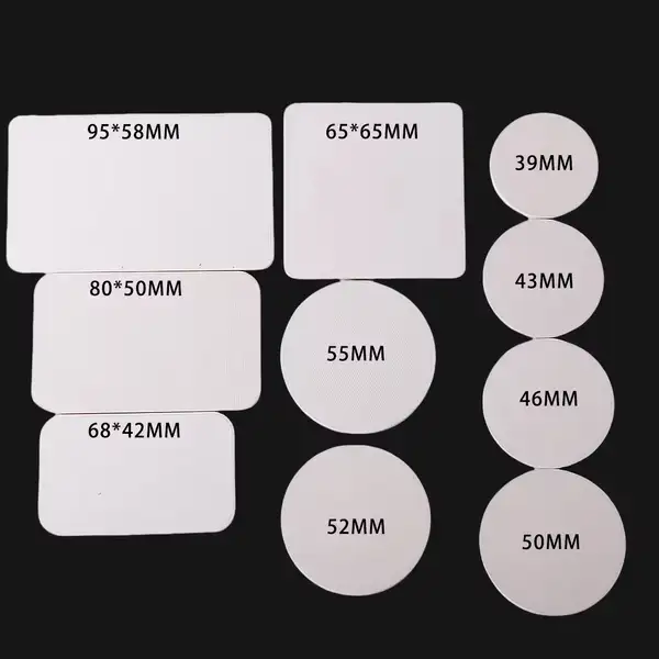 A set of white rectangular and circular blank items with various dimensions labeled on them, arranged against a black background.